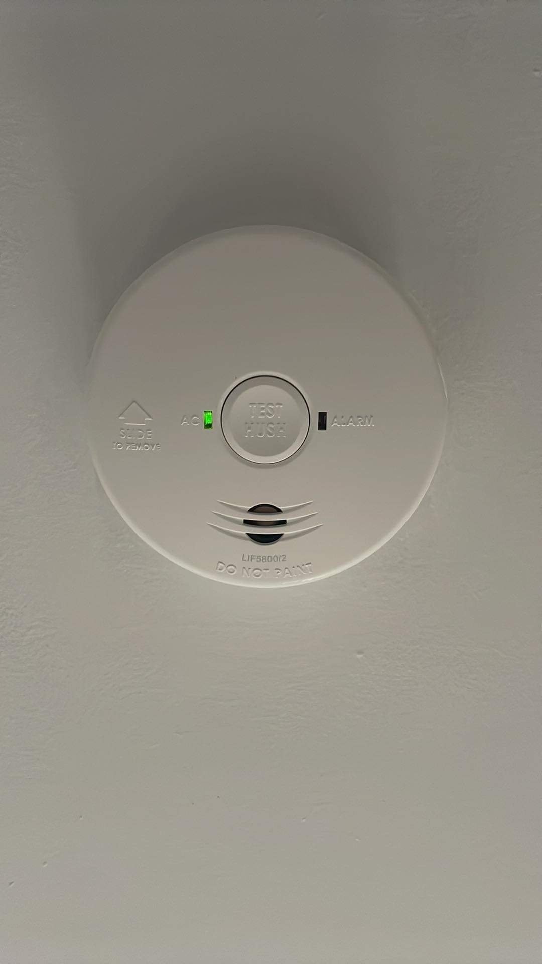 Smoke alarm installation into hallway of home in Joondalup